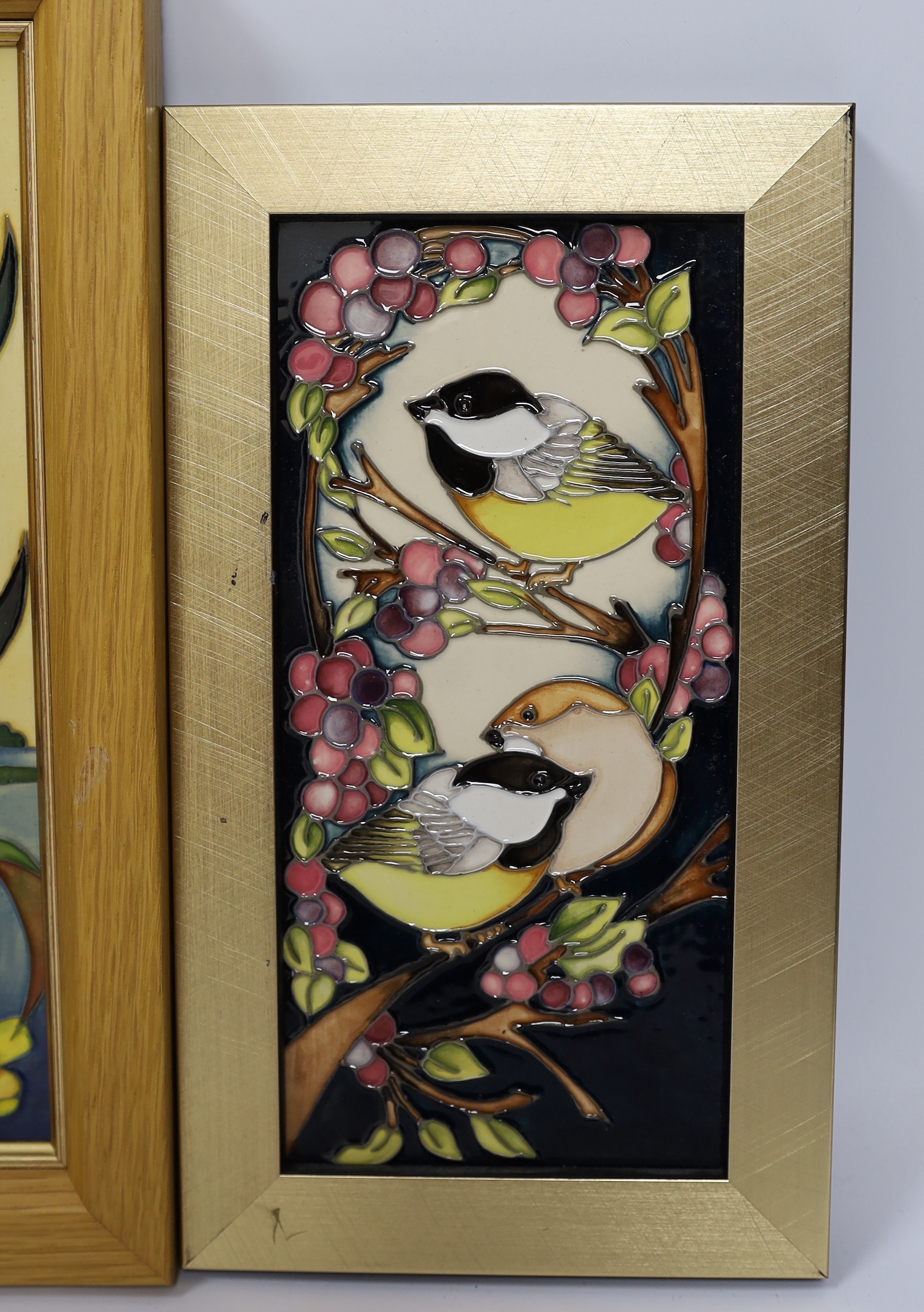 A Moorcroft Rachel Bishop wall plaque of bulrushes, another similar plaque and a signed print by Paul Hilditch, ‘A Vision of Windsor’, largest overall 60cm x 48cm